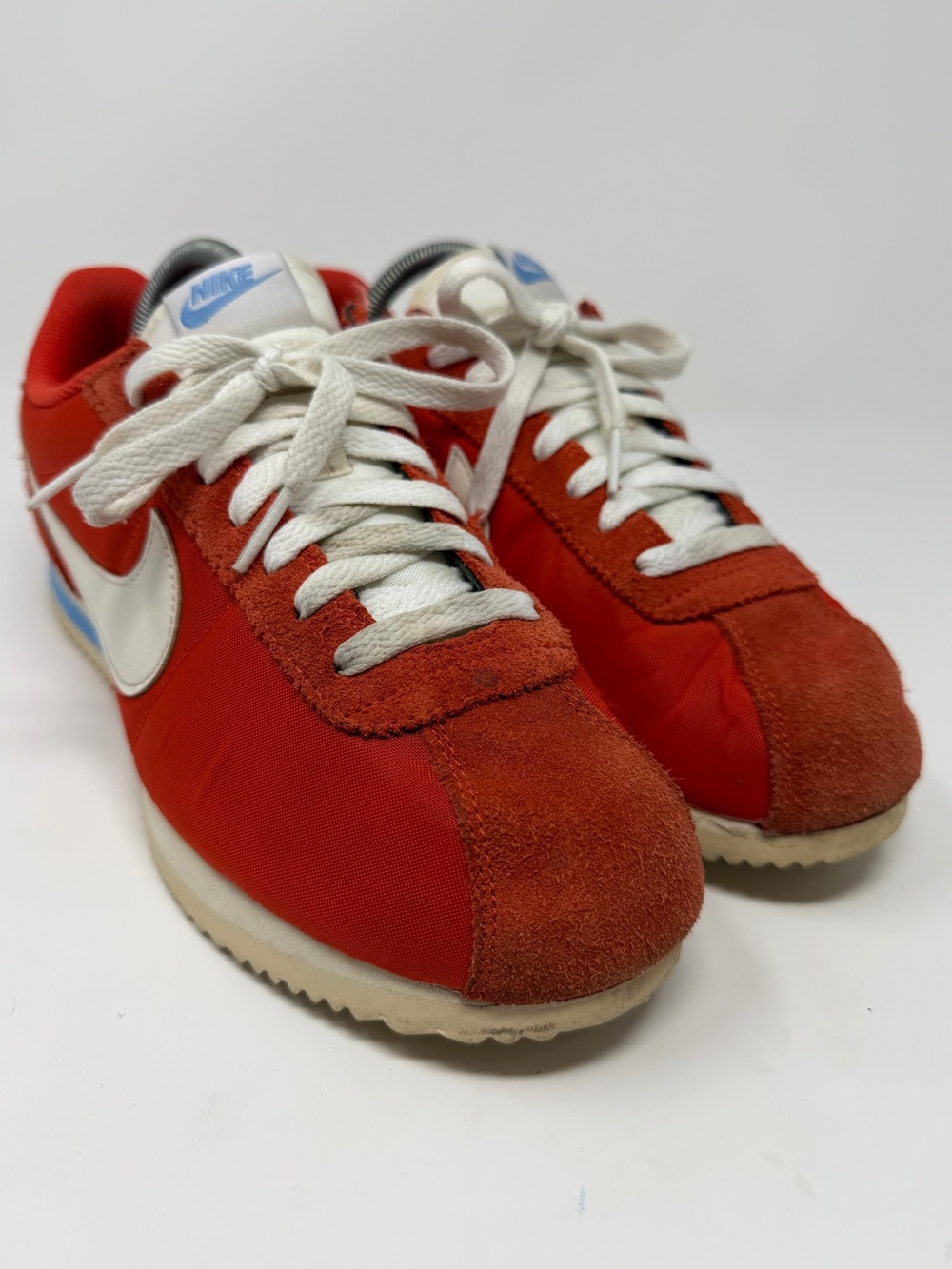 Nike womens Cortez in orange /White and blue Sz.9.5